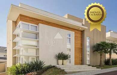 Imagem: A casa em condomínio possui 4 Dormitórios, 5 Banheiros, 4