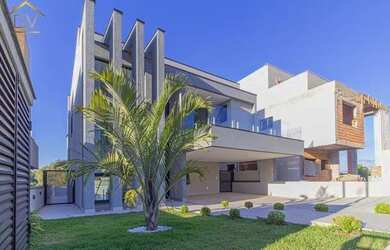 Imagem: A casa em condomínio possui 4 Dormitórios, 5 Banheiros, 4