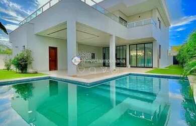 Imagem: A casa em condomínio possui 4 Dormitórios, 5 Banheiros, 368m²