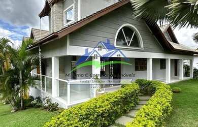 Imagem: A casa em condomínio possui 5 Dormitórios, 5 Banheiros, 5