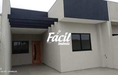 Imagem: A casa possui 3 Dormitórios, 1 Banheiro, 2 Vagas na garagem