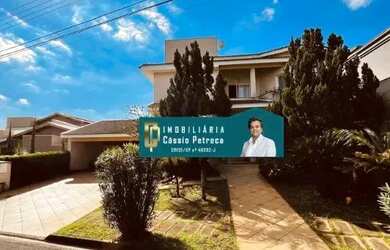 Imagem: A casa em condomínio para alugar possui 4 Dormitórios, 5 Banheiros