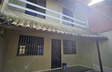 Imagem: A casa possui 2 Dormitórios, 3 Banheiros, 1 Vaga na garagem