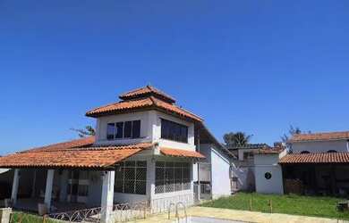 Imagem: A casa possui 5 Dormitórios, 4 Banheiros, 5 Vagas na garagem