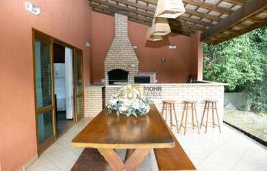 Imagem: A casa em condomínio à venda possui 4 Dormitórios, 3 Banheiros