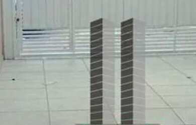 Imagem: A casa possui 3 Dormitórios, 2 Banheiros, 2 Vagas na garagem