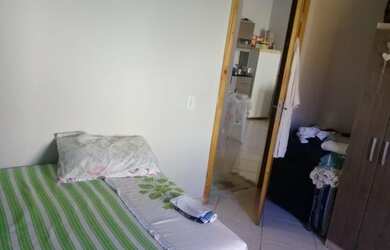 Imagem: A casa possui 4 Dormitórios, 2 Vagas na garagem e está localizado