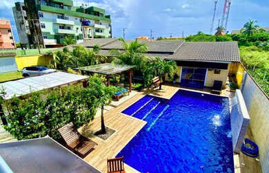 Imagem: A casa possui 5 Dormitórios, 5 Banheiros, 5 Vagas na garagem