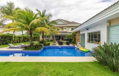 Imagem: A casa em condomínio possui 5 Dormitórios, 5 Banheiros, 4