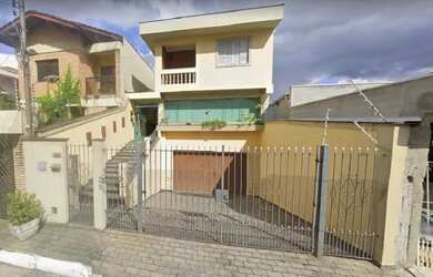 Imagem: A casa possui 4 Dormitórios, 5 Banheiros, 5 Vagas na garagem