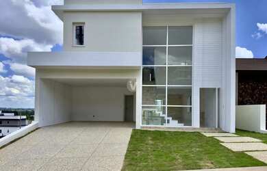 Imagem: A casa em condomínio possui 4 Dormitórios, 5 Banheiros, 4