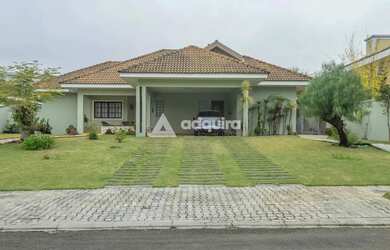 Imagem: A casa em condomínio possui 4 Dormitórios, 5 Banheiros, 2