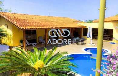 Imagem: A casa em condomínio possui 5 Dormitórios, 5 Banheiros, 3