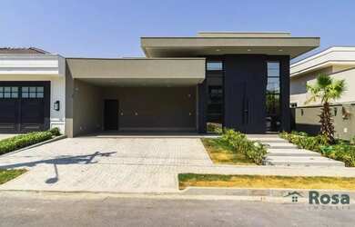 Imagem: A casa possui 3 Dormitórios, 5 Banheiros, 4 Vagas na garagem