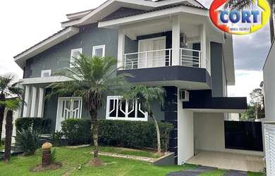 Imagem: A casa em condomínio possui 4 Dormitórios, 2 Banheiros, 4