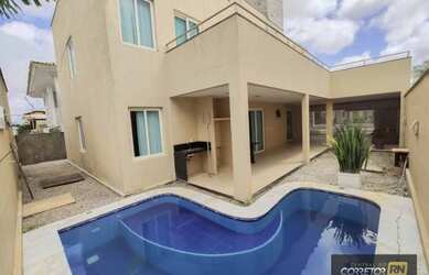 Imagem: A casa possui 5 Dormitórios, 5 Banheiros, 4 Vagas na garagem