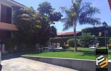 Imagem: A casa possui 4 Dormitórios, 5 Banheiros, 5 Vagas na garagem