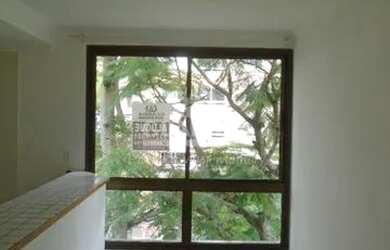 Imagem: O apartamento possui 1 Dormitório, 1 Banheiro, 1 Vaga na garagem