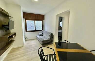 Imagem: O apartamento possui 2 Dormitórios, 1 Banheiro, 1 Vaga na garagem