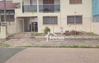 Imagem: A casa possui 3 Dormitórios, 2 Banheiros, 1 Vaga na garagem