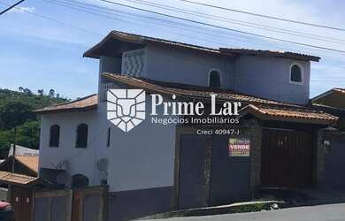 Imagem: A casa possui 5 Dormitórios, 3 Banheiros, 3 Vagas na garagem