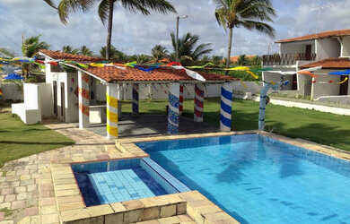 Imagem: A casa possui 4 Dormitórios, 1 Vaga na garagem e está localizado