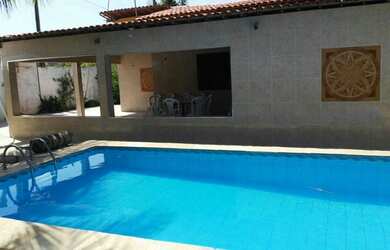 Imagem: A casa possui 3 Dormitórios, 5 Vagas na garagem e está localizado