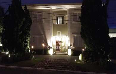 Imagem: A casa em condomínio possui 5 Dormitórios, 5 Banheiros, 5