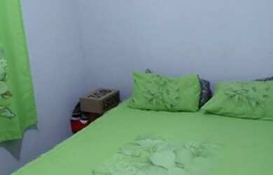 Imagem: A casa possui 2 Dormitórios, 1 Banheiro, 2 Vagas na garagem