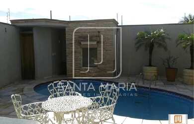 Imagem: A casa possui 4 Dormitórios, 5 Banheiros, 4 Vagas na garagem