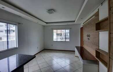 Imagem: A casa possui 3 Dormitórios, 2 Banheiros, 1 Vaga na garagem