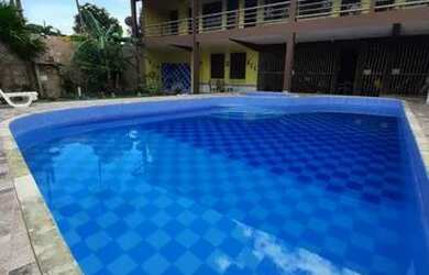 Imagem: A casa possui 3 Dormitórios, 4 Banheiros, 3 Vagas na garagem