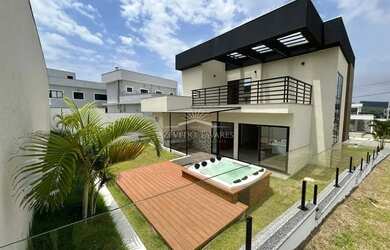 Imagem: A casa em condomínio possui 3 Dormitórios, 4 Banheiros, 2