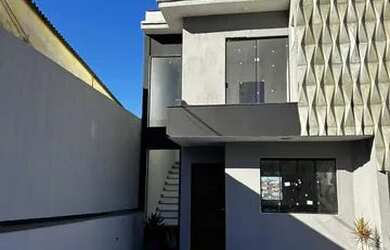 Imagem: A casa possui 3 Dormitórios, 3 Banheiros, 4 Vagas na garagem