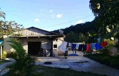 Imagem: A casa possui 3 Dormitórios, 3 Banheiros, 1 Vaga na garagem