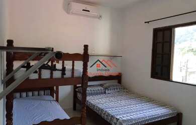 Imagem: A casa em condomínio possui 2 Dormitórios, 3 Banheiros, 1