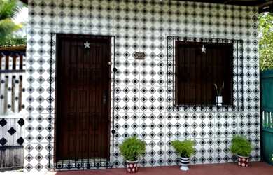 Imagem: A casa possui 2 Dormitórios e 1 Banheiro e está localizado