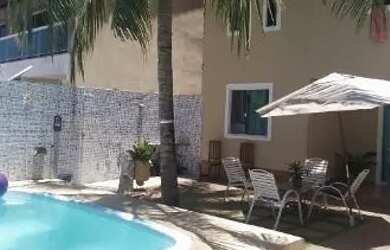 Imagem: A casa possui 4 Dormitórios, Acomodam 12 pessoas, 2 Vagas na