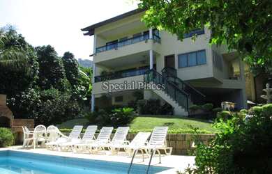 Imagem: A casa em condomínio possui 5 Dormitórios, 5 Banheiros, 5