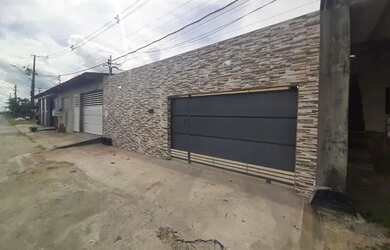 Imagem: A casa possui 2 Dormitórios, 1 Banheiro, 1 Vaga na garagem