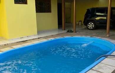 Imagem: A casa possui 3 Dormitórios, 3 Banheiros, 2 Vagas na garagem