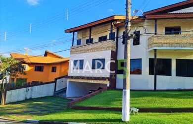 Imagem: A casa em condomínio possui 5 Dormitórios, 4 Banheiros, 4