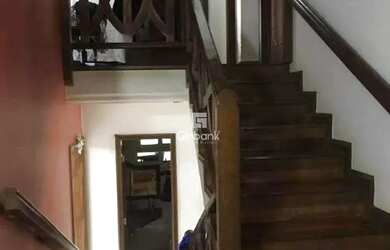 Imagem: A casa possui 3 Dormitórios, 3 Banheiros, 3 Vagas na garagem