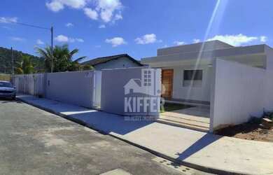 Imagem: A casa possui 2 Dormitórios, 3 Banheiros, 3 Vagas na garagem