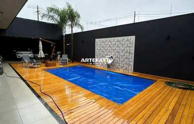 Imagem: A casa possui 3 Dormitórios, 5 Banheiros, 5 Vagas na garagem