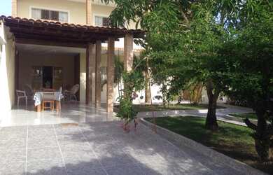 Imagem: A casa em condomínio possui 3 Dormitórios e 5 Vagas na garagem