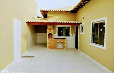 Imagem: A casa possui 2 Dormitórios, 2 Banheiros, 1 Vaga na garagem