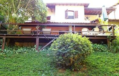 Imagem: A casa em condomínio possui 4 Dormitórios, 5 Banheiros, 4