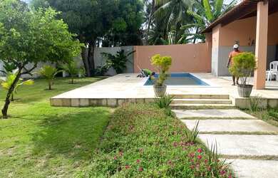 Imagem: A casa possui 5 Dormitórios, 4 Banheiros, 5 Vagas na garagem