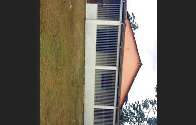 Imagem: A casa possui 2 Dormitórios, 1 Banheiro e 4 Vagas na garagem